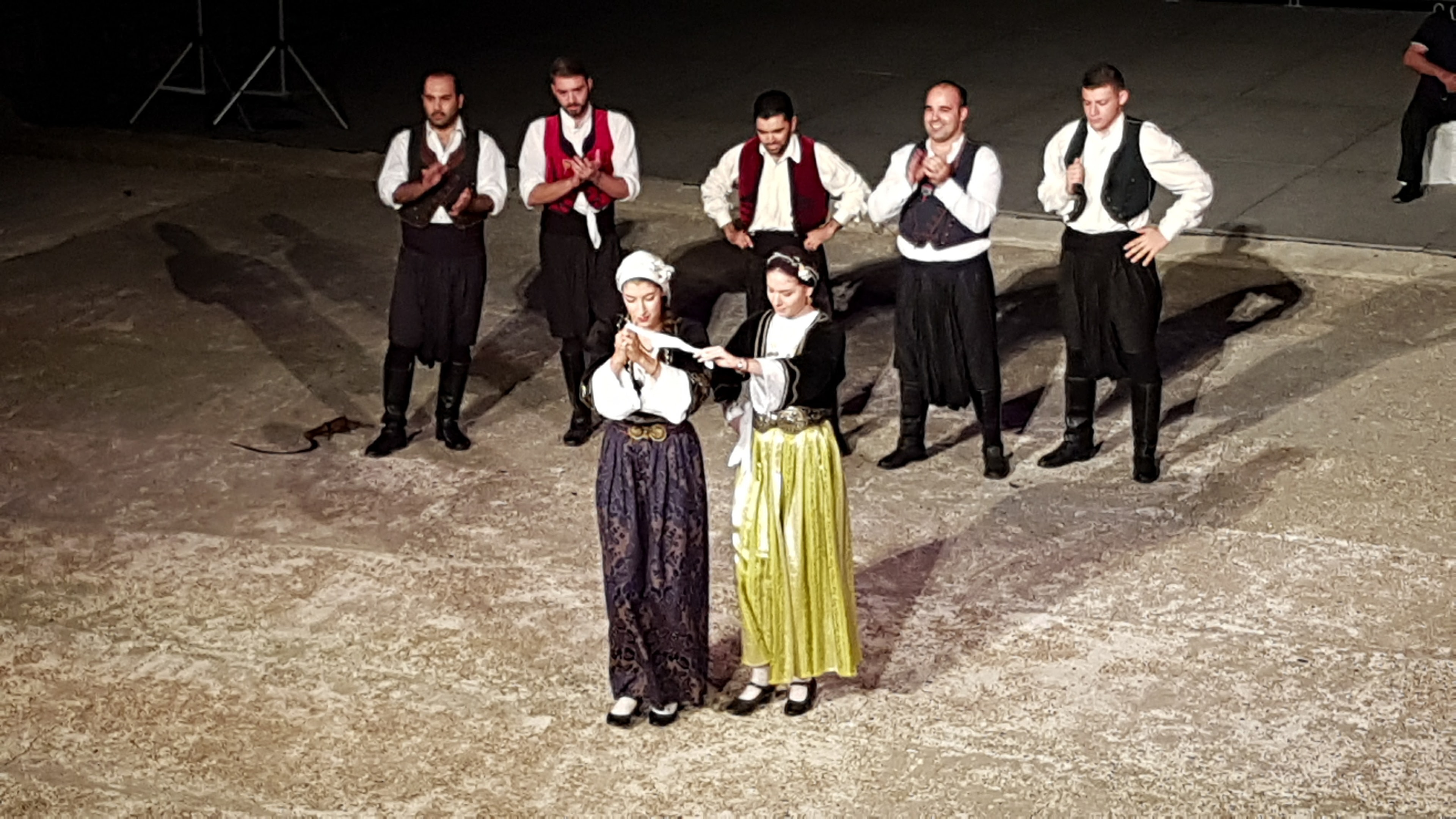 Traditional performers on stage at the ancient amphitheatre