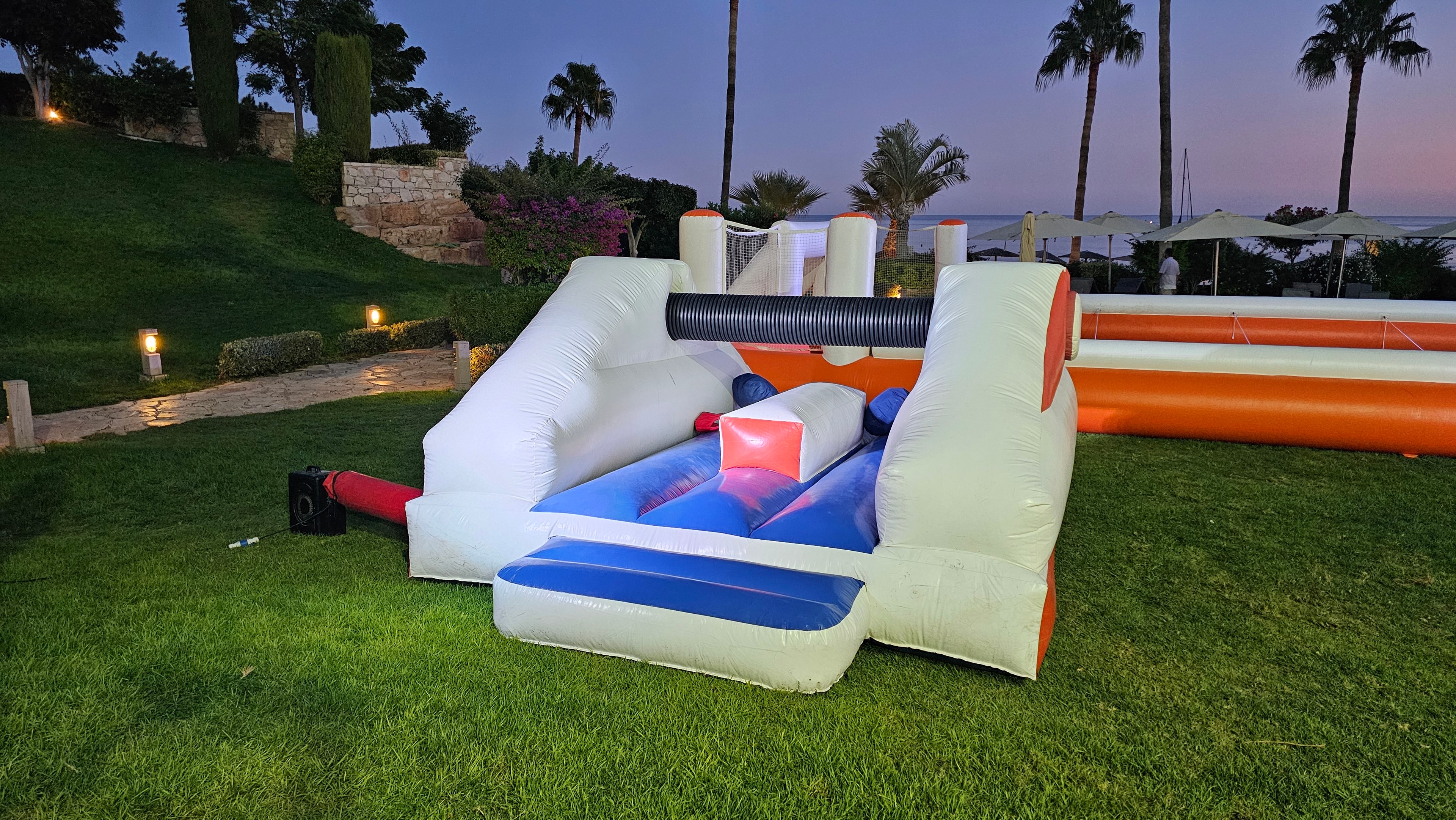 Participants taking on an inflatable water course in Cyprus