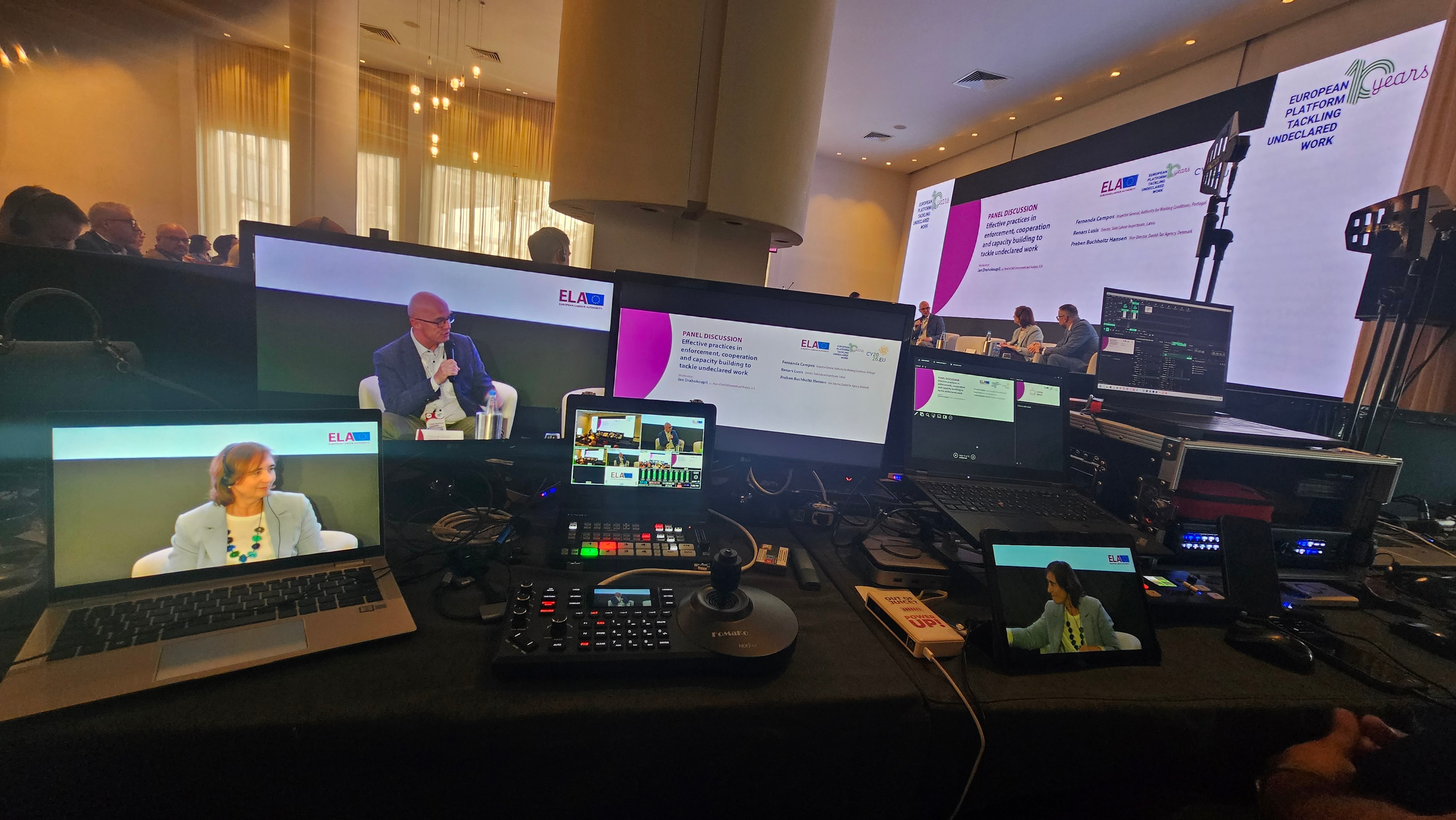 Conference production control room monitoring a European Union panel discussion