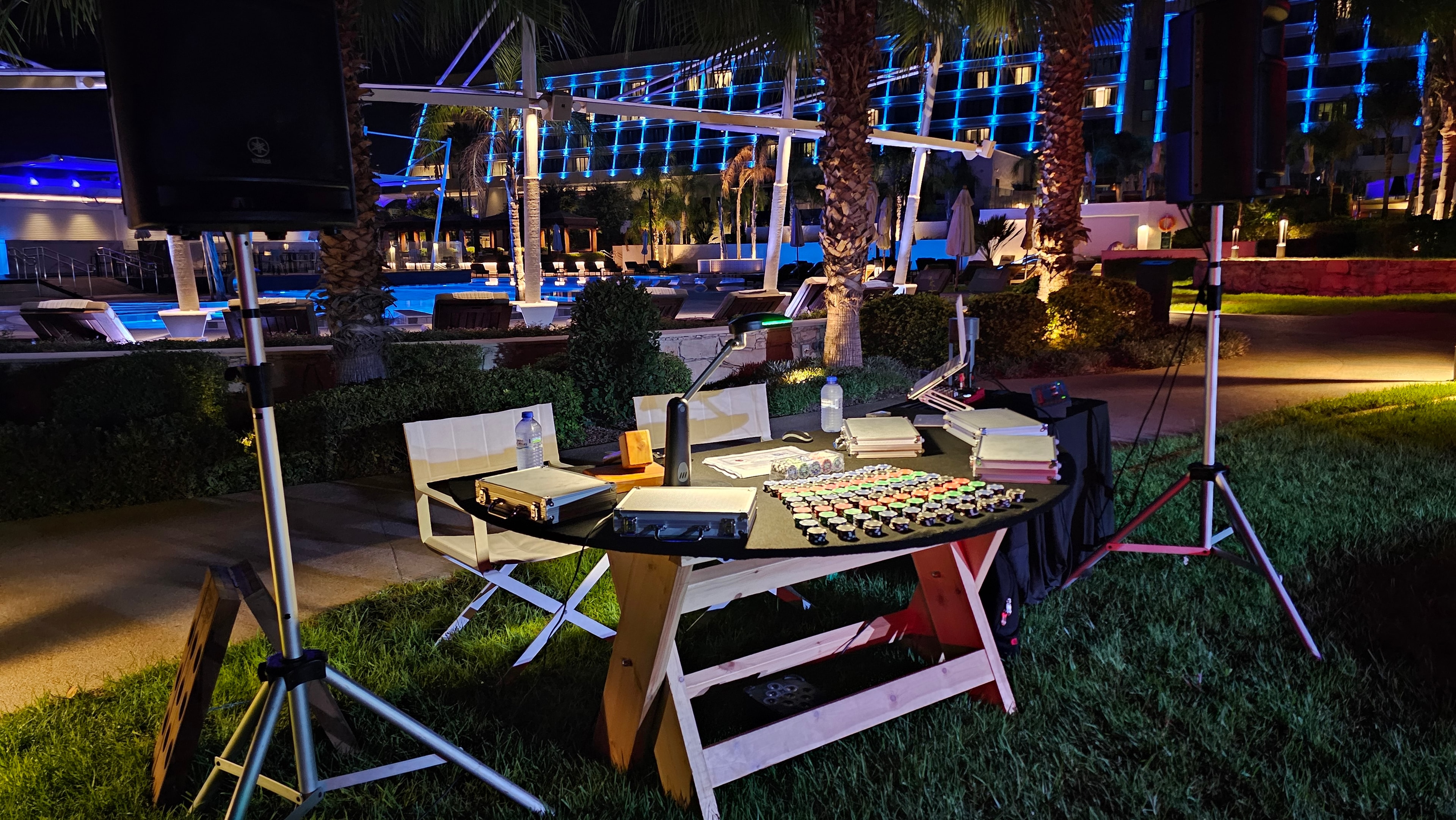 Casino-style table with chips and event equipment